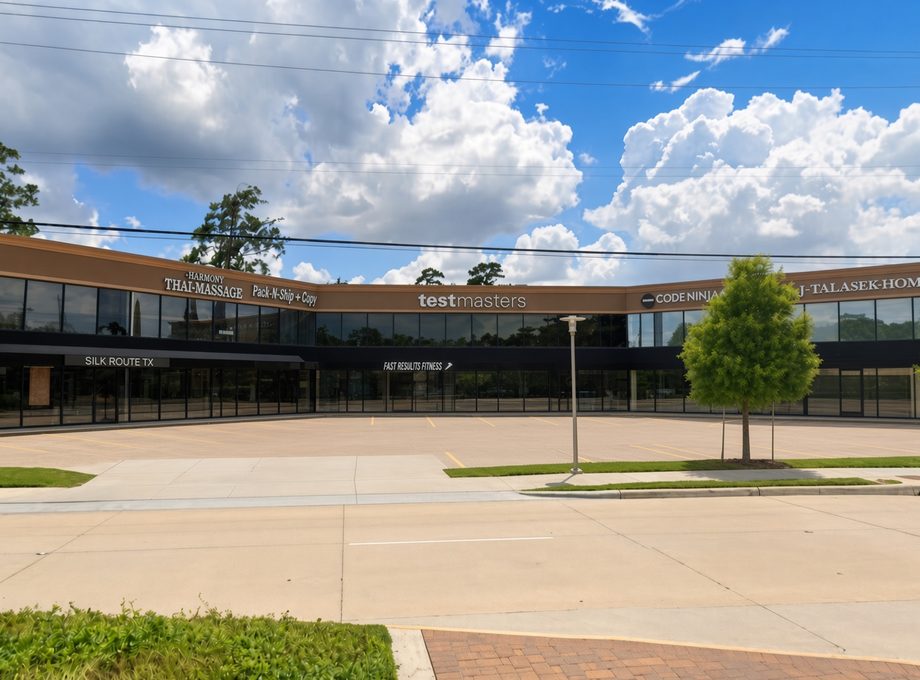 Memorial retail center storefronts with parking